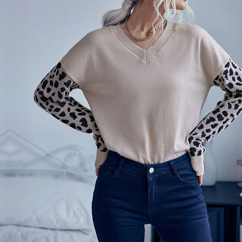 Damen V‑Ausschnitt-Feinstrickpullover mit Animal-Motivärmeln und elastischem Saum Shop Nory