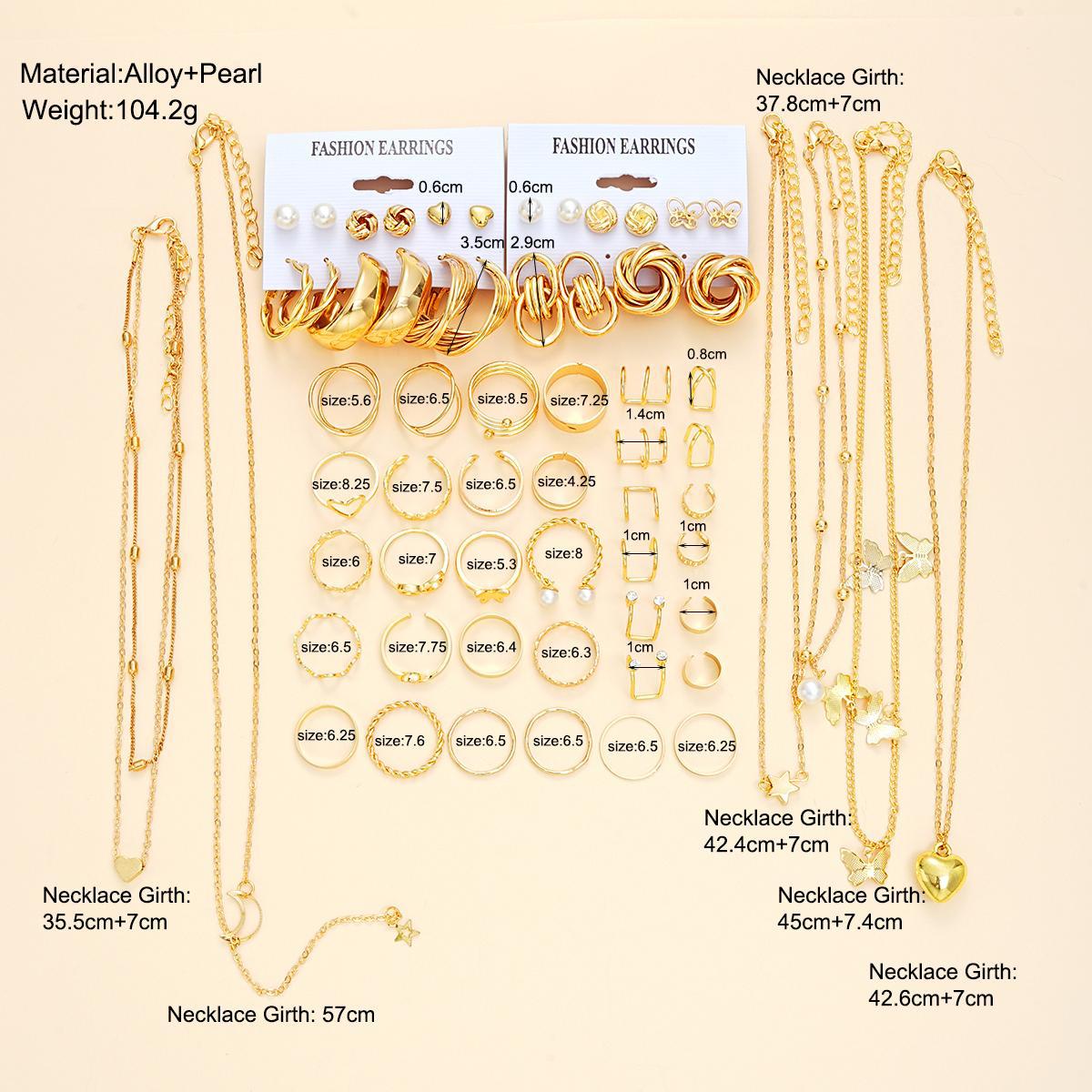 Damen Schmuckset mit mehrlagigen Ketten und vielfältigen Ringen Shop Nory