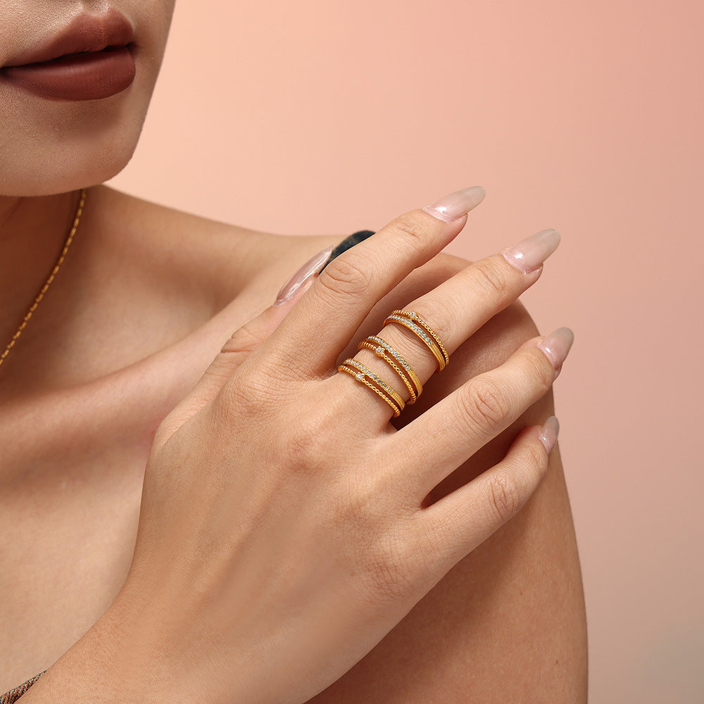 Damen Offener Ring aus Titanstahl mit Zirkonia und gewundenem Design Shop Nory