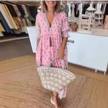Frauen Boho Maxi Kleid aus leichtem Viskose-Mix mit V-Ausschnitt, Quastenbändchen, drei Viertelärmeln und seitlichen Taschen Shop Nory