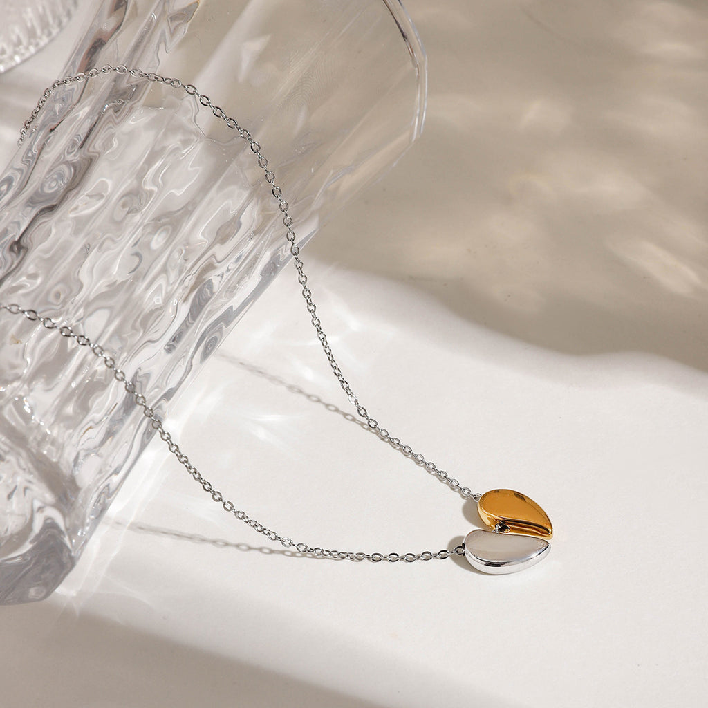 Damen Halskette mit herzförmigem Anhänger aus wasserfestem und hypoallergenem Edelstahl Shop Nory