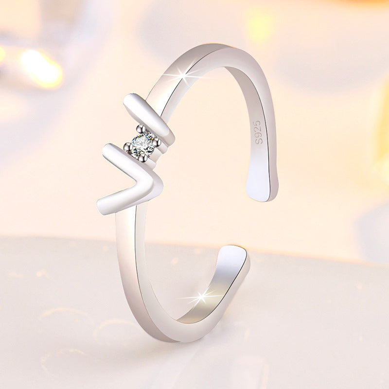 Damen Offener Ring mit geschwungenem Design und funkelndem Zirkonia-Besatz Shop Nory
