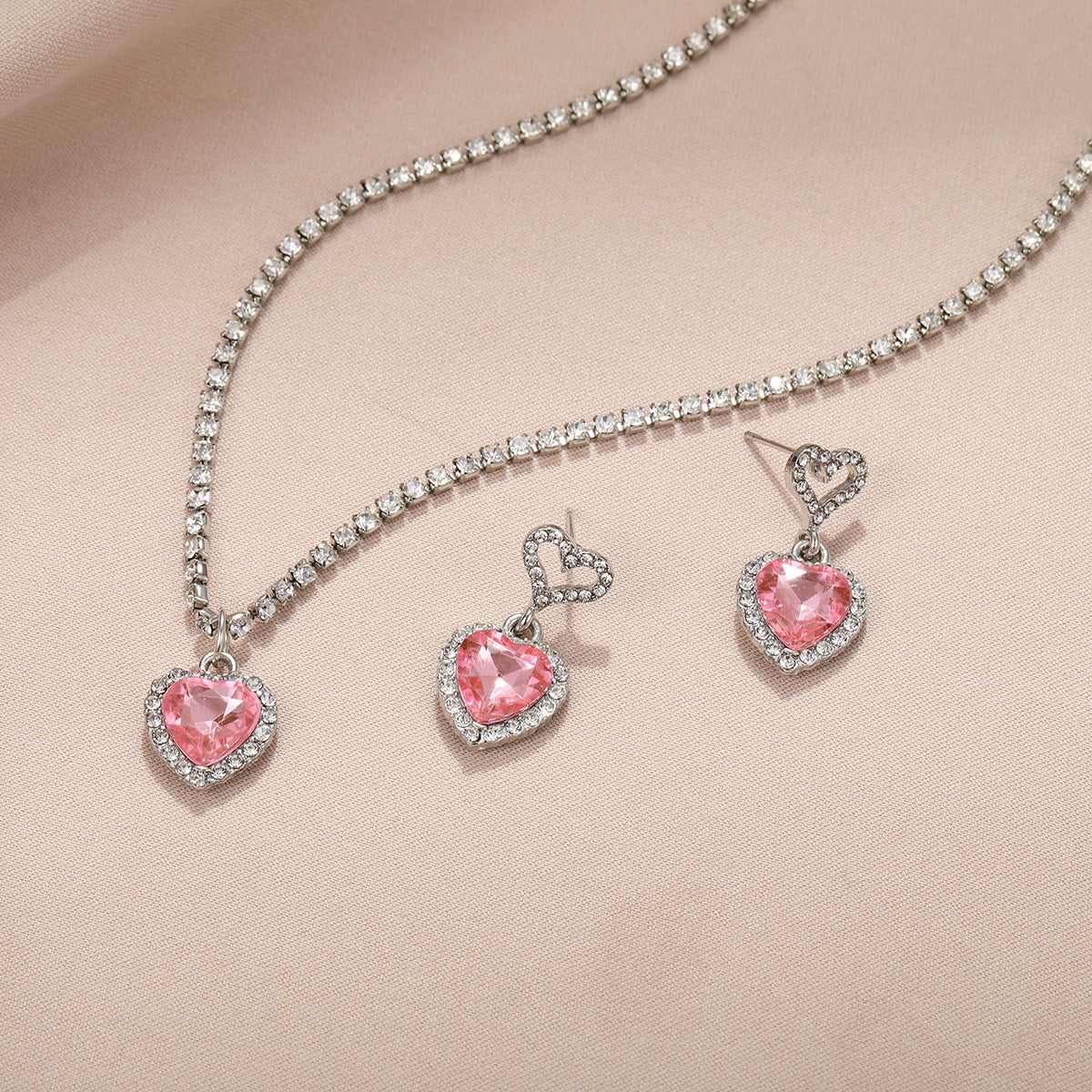 Damen Schmuckset mit herzförmigen Anhängern aus funkelndem Rosenquarz Shop Nory
