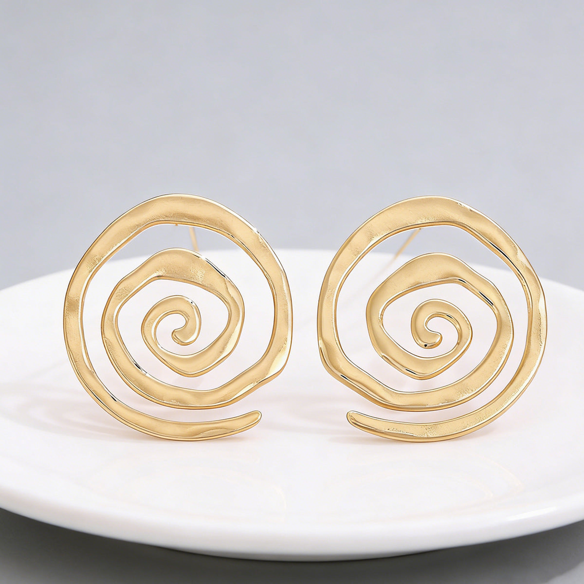 Damen Ohrstecker im modernen Spiralmuster Shop Nory