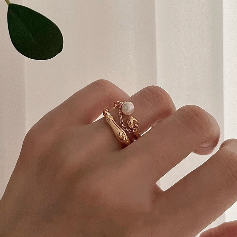 Damen Offener Ring mit künstlerischem Wellen-Design und elegantem Perlenanhänger Shop Nory