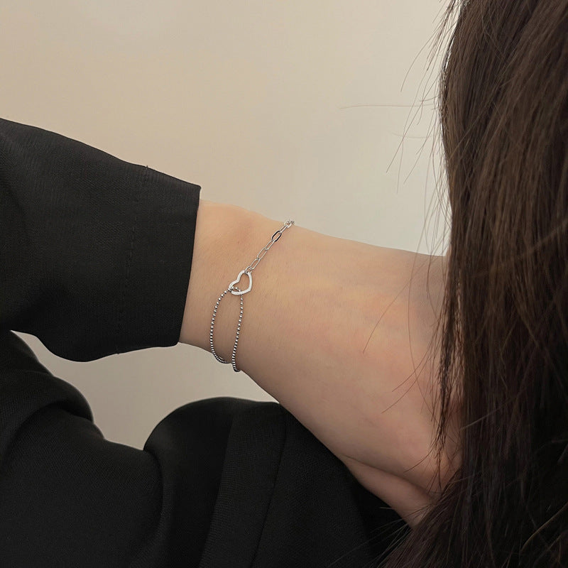 Damen Armkette mit zartem Herz-Design und eleganter Kettenstruktur Shop Nory