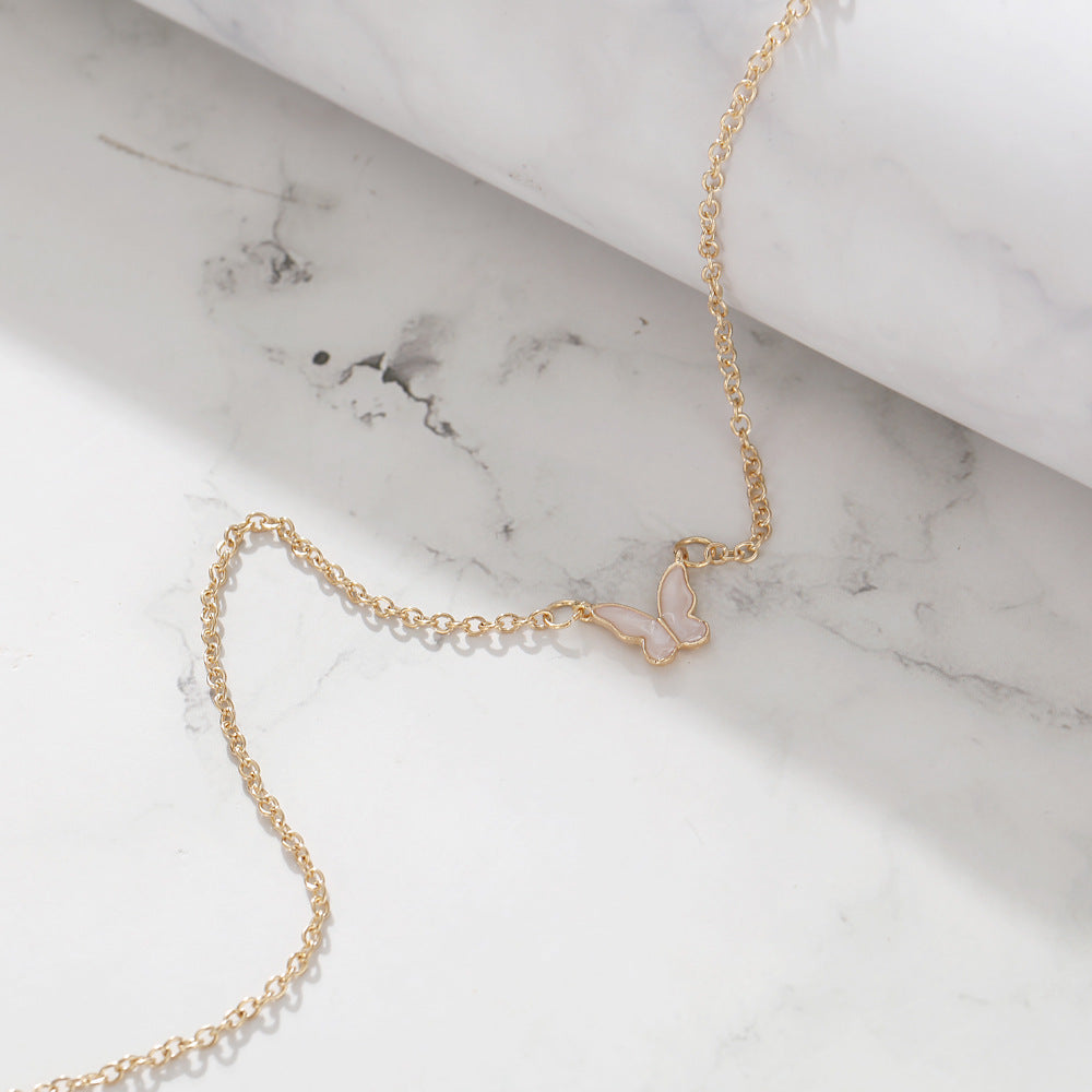 Damen Halskette mit filigranem Schmetterlingsanhänger aus luxuriösem Metall Shop Nory
