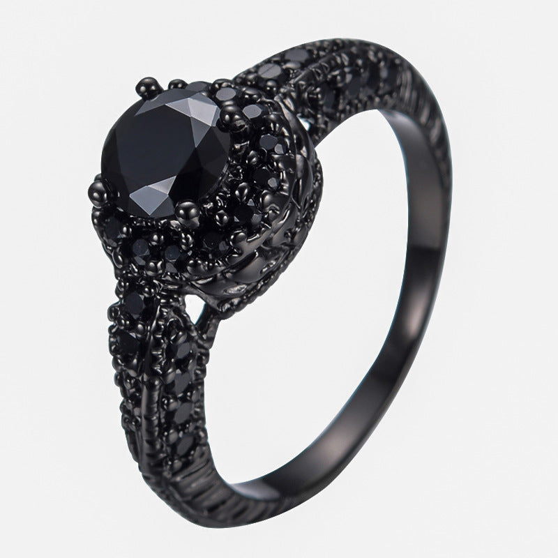 Damen Ring mit kunstvollem schwarzem Stein und filigraner Details Shop Nory