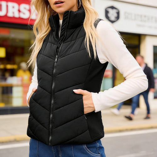 Damen Steppweste mit hohem Stehkragen und figurbetonten Stretchseiten Shop Nory