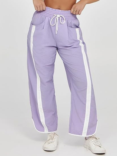 Damen nan relaxte Trackpants mit seitlichem Kontraststreifen, elastischem Smokbund und Eingrifftaschen Shop Nory
