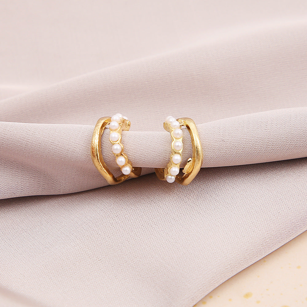 Damen-Ohrstecker mit elegantem Perlen-Design und geschwungenem Metallrahmen Shop Nory