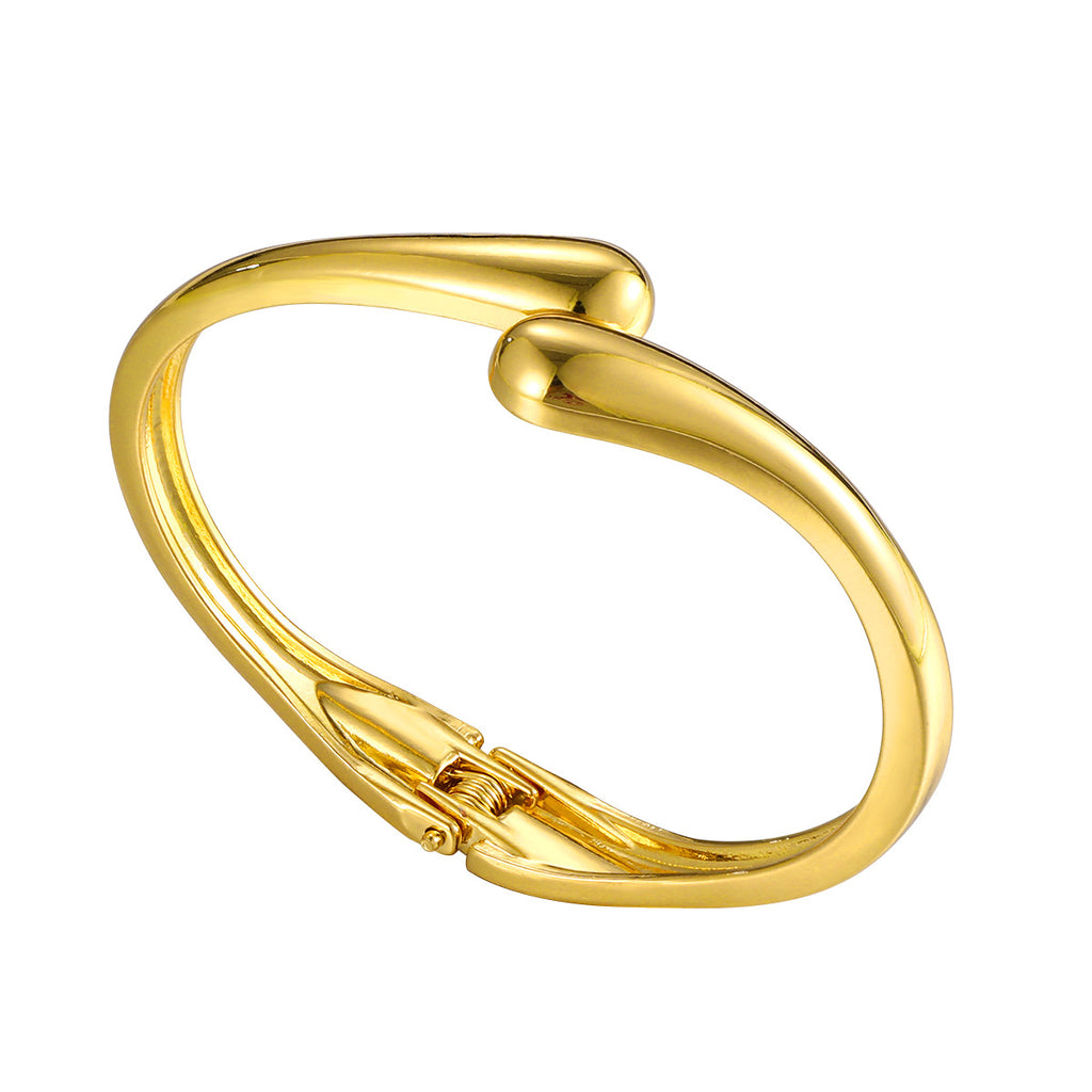 Damen eleganter goldfarbener Armreif Shop Nory