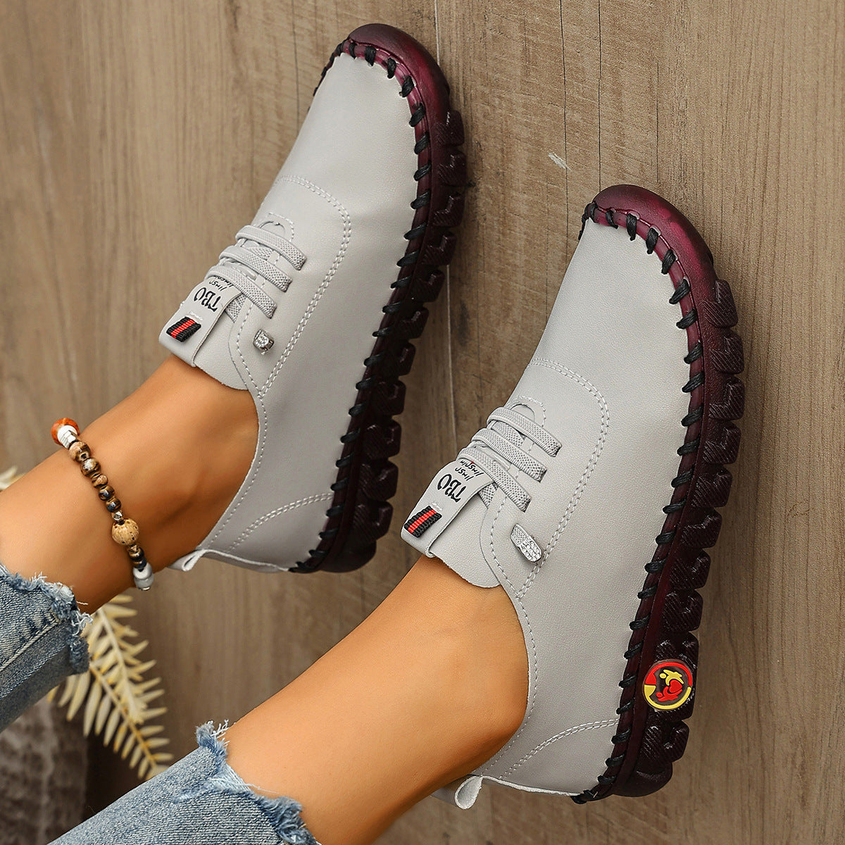 Damen Freizeit-Leder-Sneaker mit elastischen Schnürsenkeln und rutschfester Sohle