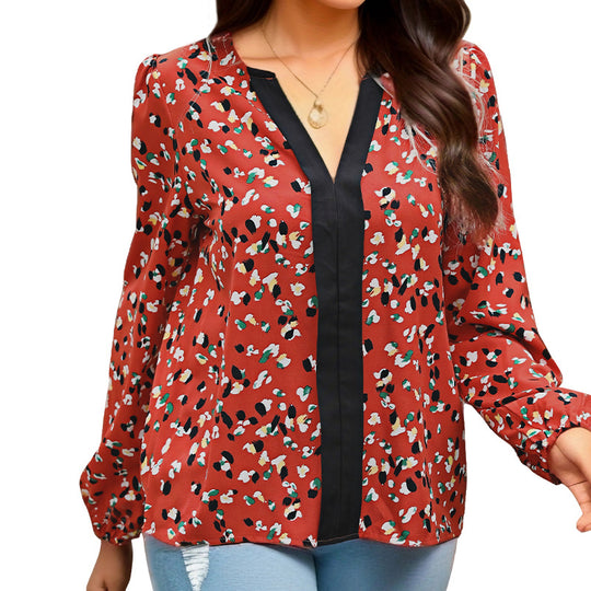 Damen Locker geschnittene V-Ausschnitt-Bluse mit kontrastierter Zierblende und Allover-Print Shop Nory
