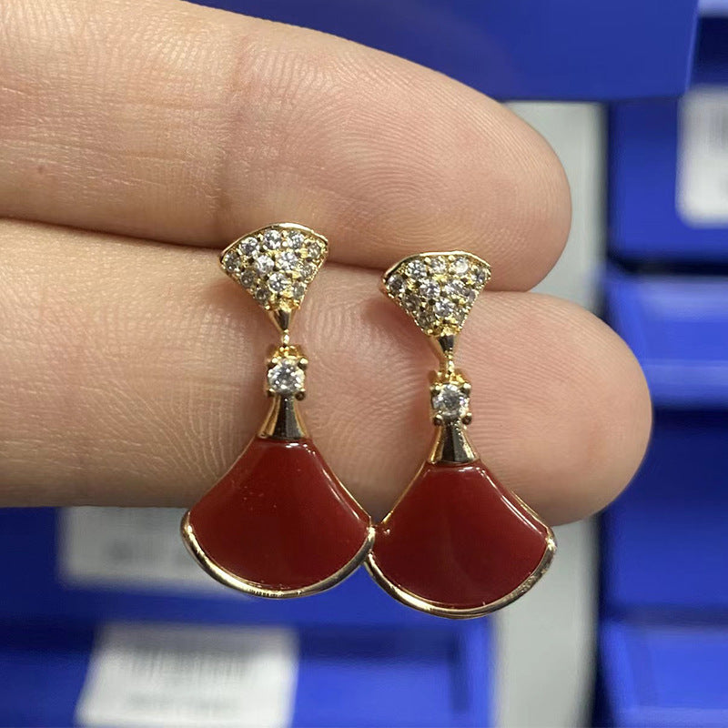 Damen Ohrringe mit kunstvollem Perlmutt-Design und funkelnden Zirkonia Shop Nory