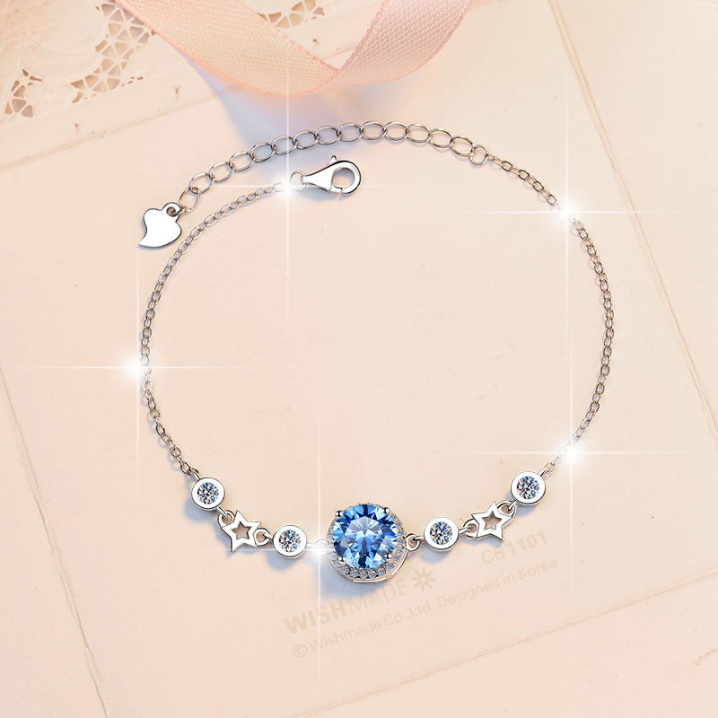 Damenarmband mit strahlendem Kristall und funkelnden Sternen Shop Nory