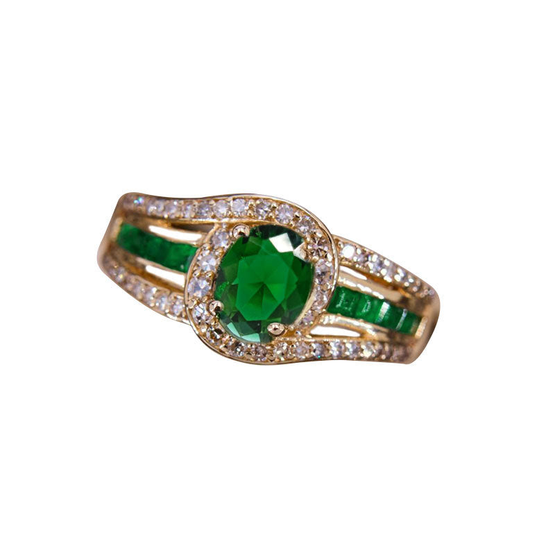Damenring mit elegantem Smaragd und funkelnden Zirkoniasteinen Shop Nory