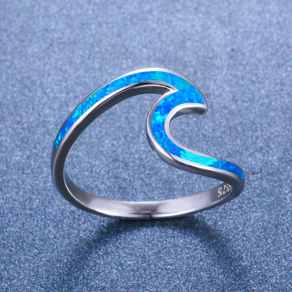 Damen Ring mit modernem, geschwungenem Design und opalisierten Akzenten Shop Nory