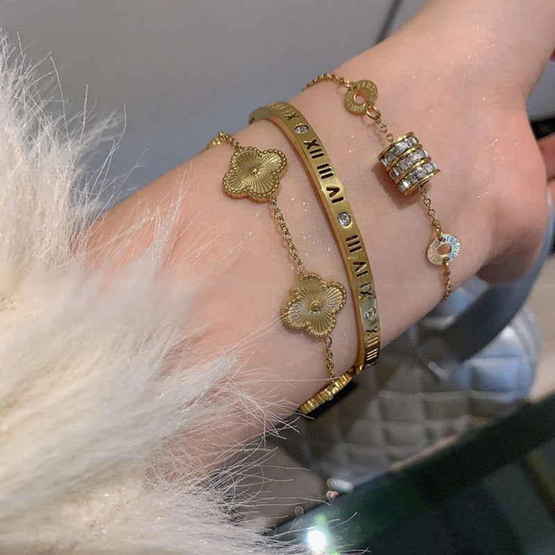 Damenarmband mit kunstvollen Blütenmotiven und hochwertiger Vergoldung Shop Nory