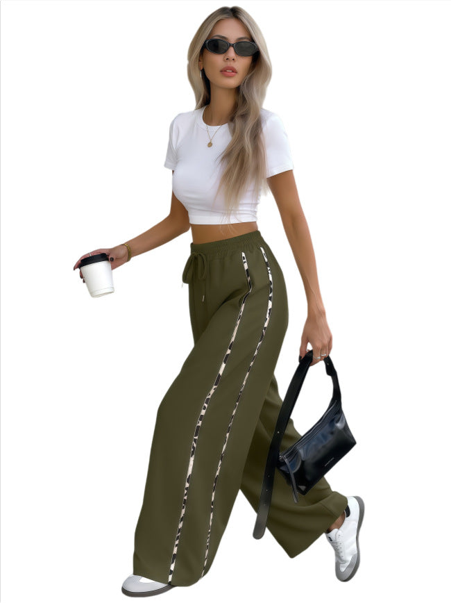 Damen Weite High‑Waist Loungehose mit Kordelzug und kontrastierenden Seitenstreifen Shop Nory