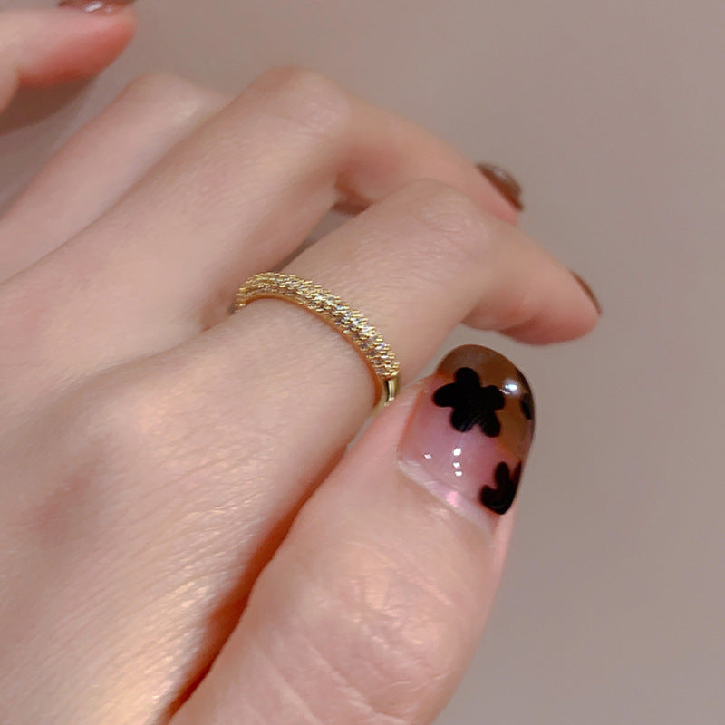 Damen zierlicher Goldring mit kunstvollem Flechtmuster Shop Nory