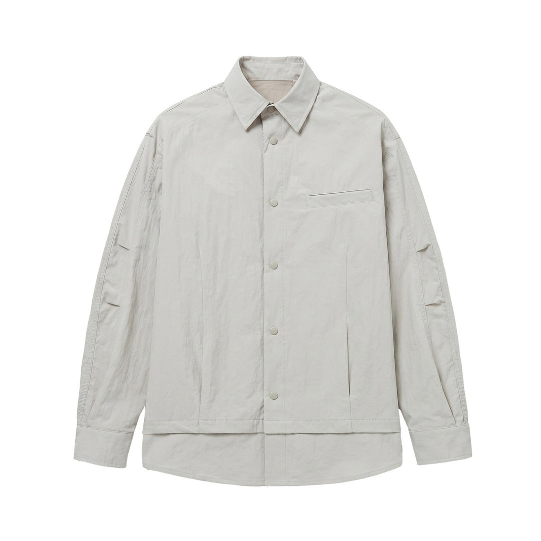 Unisex Oversize Hemdjacke mit Druckknöpfen, Kentkragen und Brust‑Welttasche Shop Nory