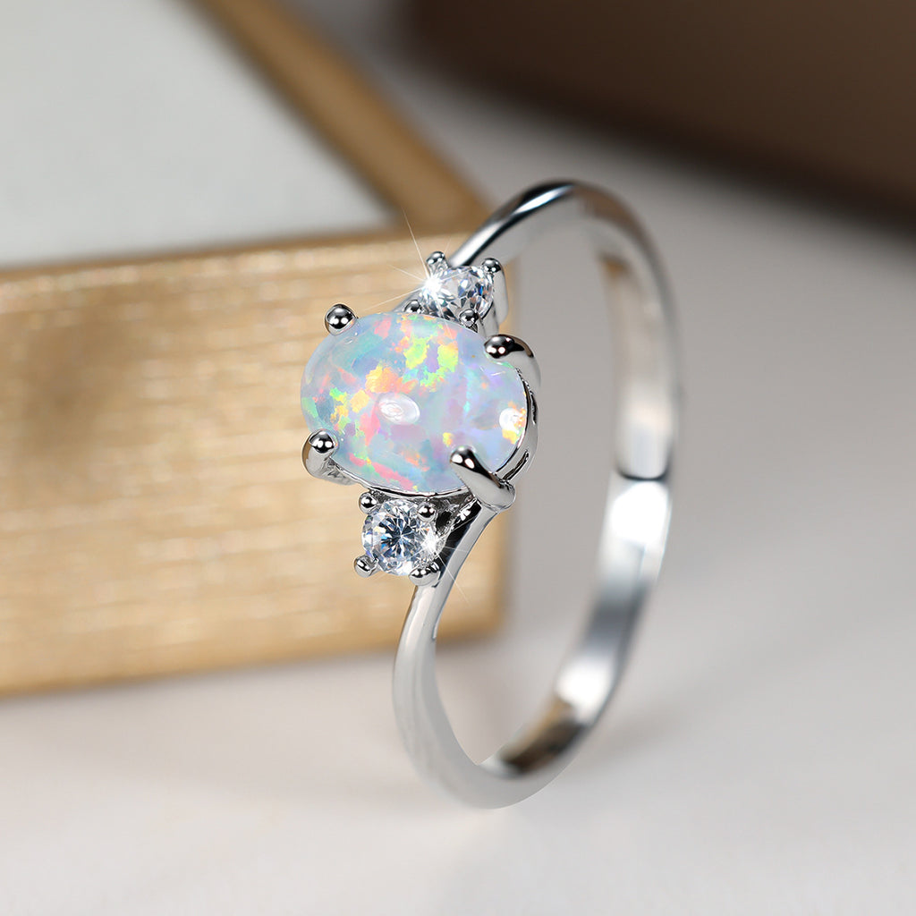 Damen Ring mit Opalstein und funkelnden Zirkonia Shop Nory