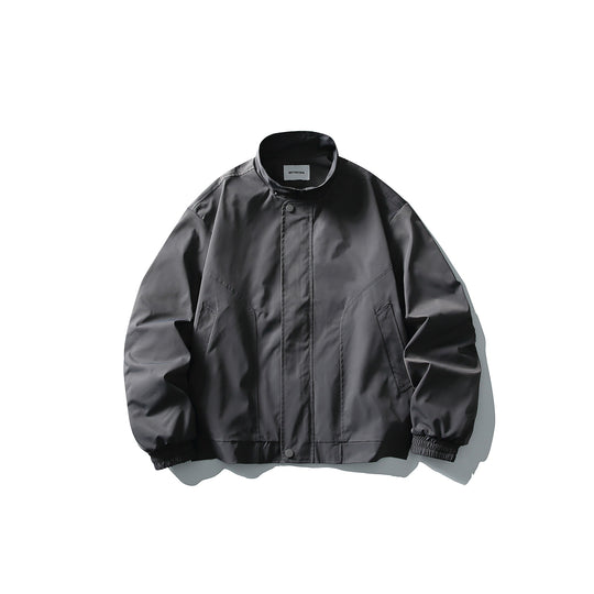 Unisex Kurz geschnittener technischer Boxy‑Bomber mit Stehkragen, Druckknopfblende und elastischen Bündchen Shop Nory