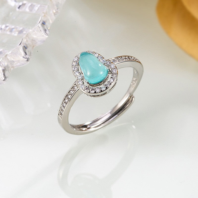 Damen Ring mit filigranem Tropfenmotiv und funkelnden Zirkonia Shop Nory