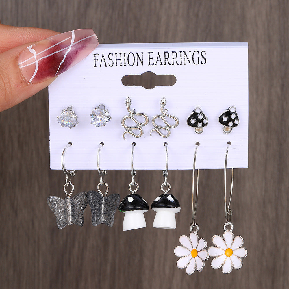 Damen Ohrringe Set mit verspielten Designs und funkelnden Elementen Shop Nory