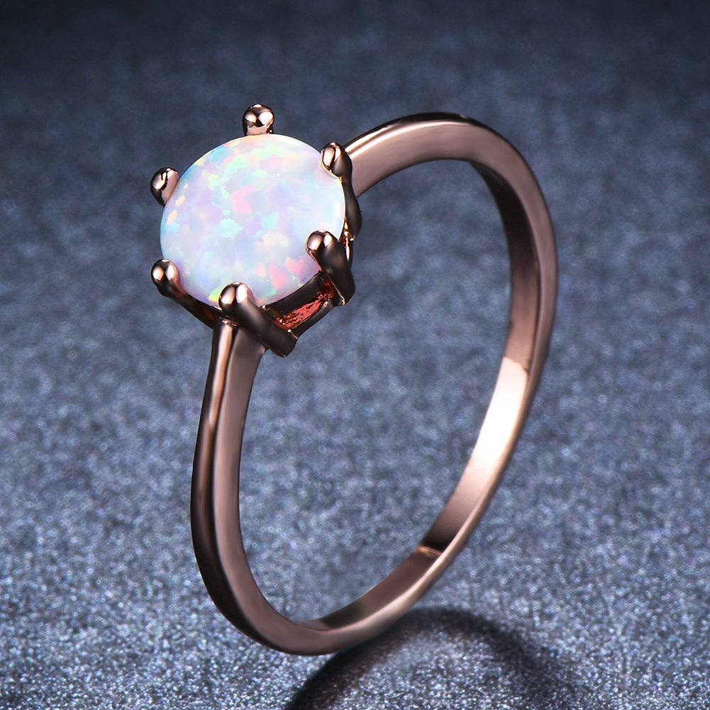Damen Ring mit schimmerndem Opalstein in eleganter Fassung Shop Nory