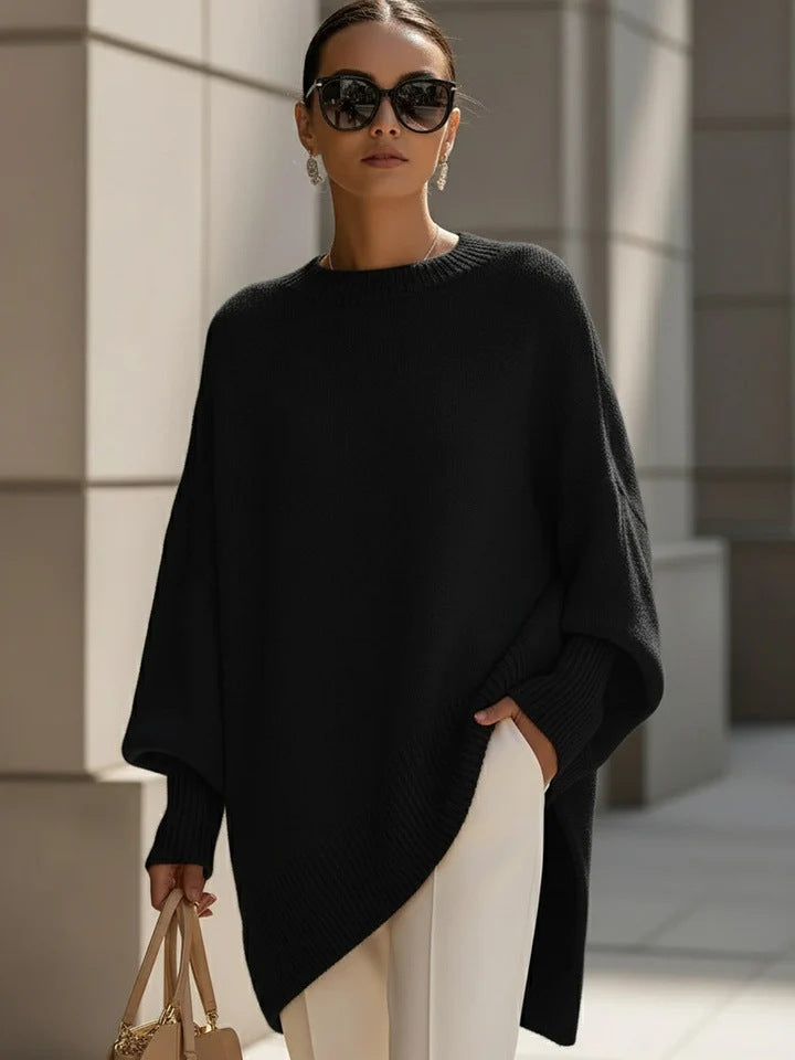 Damen nan Oversize Strickponcho mit asymmetrischem Saum und gerippten Ärmeln Shop Nory