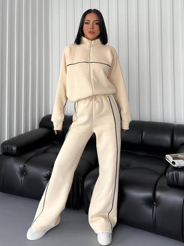 Damen lässiges Sweatset mit Stehkragen Reißverschluss gekürzter Jacke und hochtaillierter Schlaghose Shop Nory