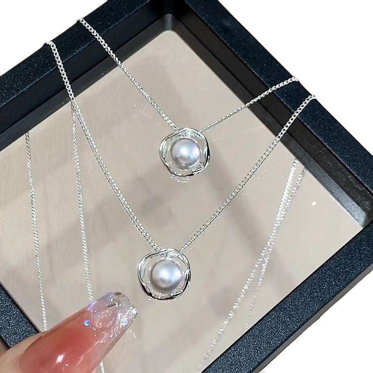 Damen Halskette mit stilvollem Perlenanhänger und feinem Drahtdesign Shop Nory
