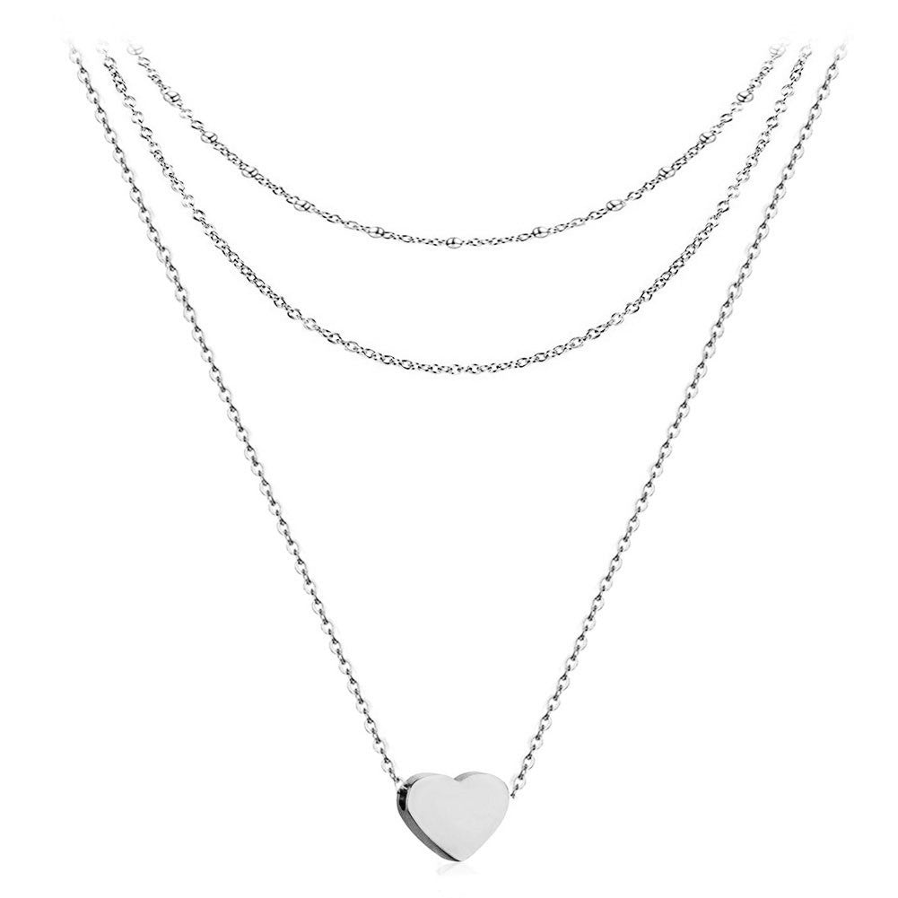 Damen Halskette mit ineinandergreifenden Kettenschichten und herzförmigem Anhänger Shop Nory