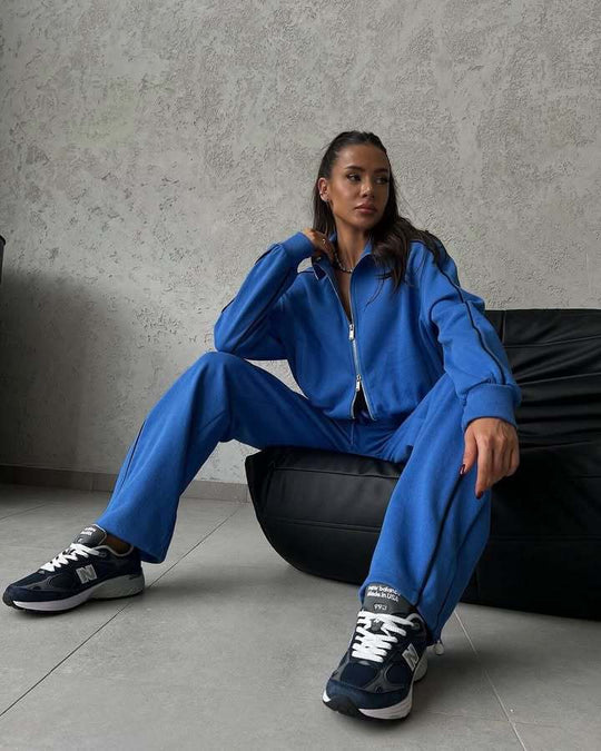 Damen lässiges Sweatset mit Stehkragen Reißverschluss gekürzter Jacke und hochtaillierter Schlaghose Shop Nory