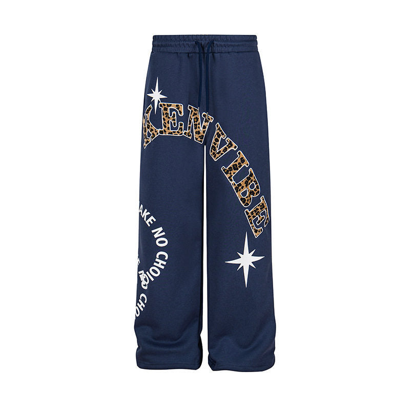 Damen Weite Jogginghose im Culotte‑Stil mit Kordelzug und Statement‑Print Shop Nory