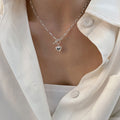 Damen Halskette mit herzförmigem Anhänger und Kettendesign Shop Nory