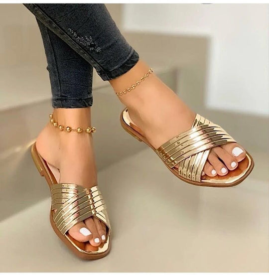 Damen Geflochtene Metallic-Slipper mit überkreuzten Riemen und flacher Komfortsohle Shop Nory