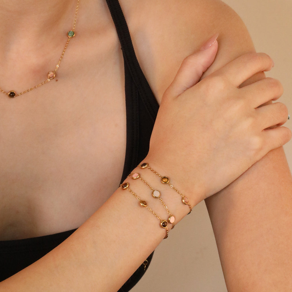 Damen Armband mit eleganten, eingefassten Edelsteinen Shop Nory