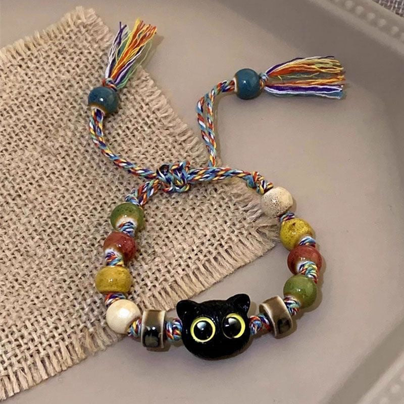Damen Armband mit handgefertigten Tiermotiven und bunten Perlen Shop Nory
