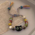 Damen Armband mit handgefertigten Tiermotiven und bunten Perlen Shop Nory