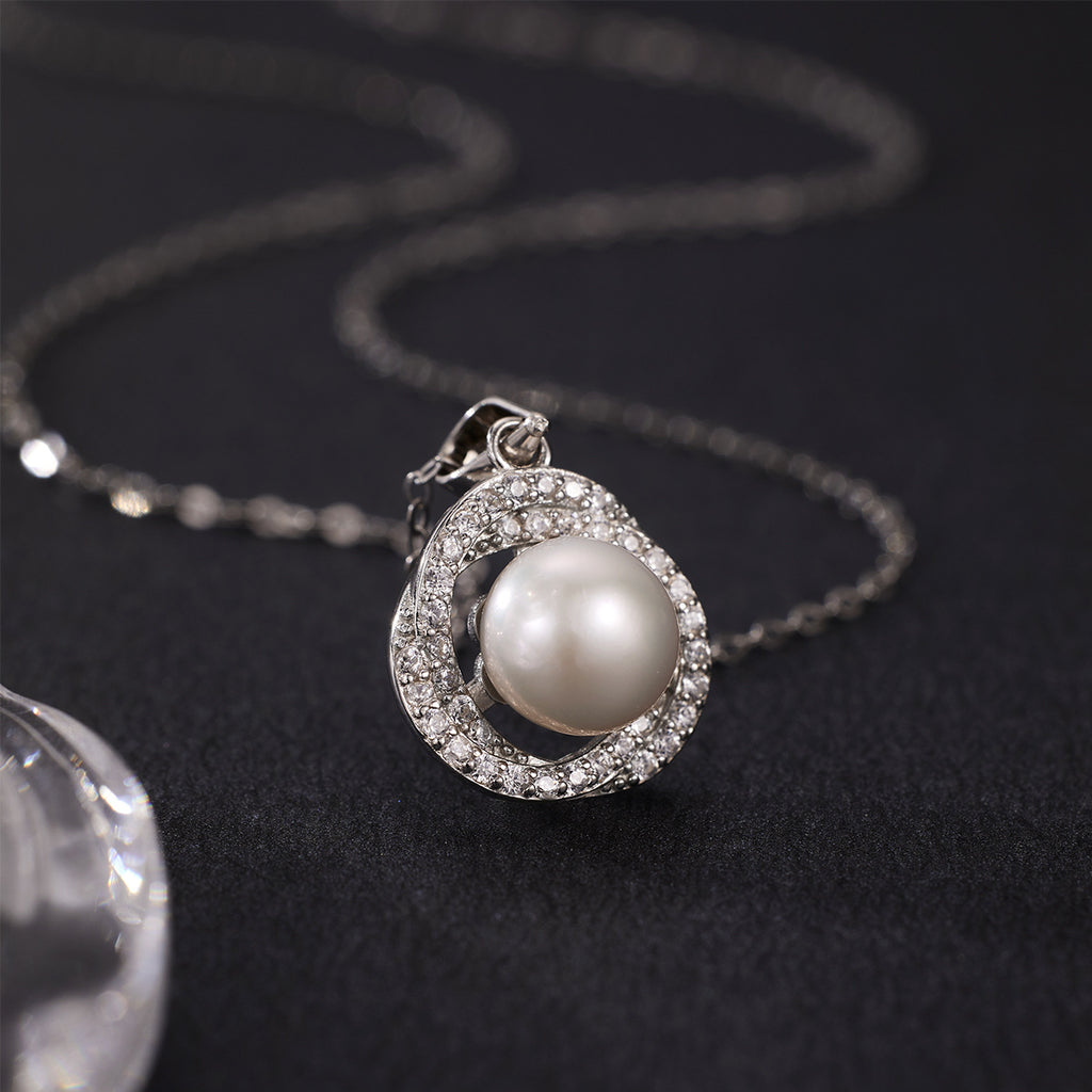 Damen elegante Halskette mit Perlenanhänger und funkelnden Zirkonia-Details Shop Nory