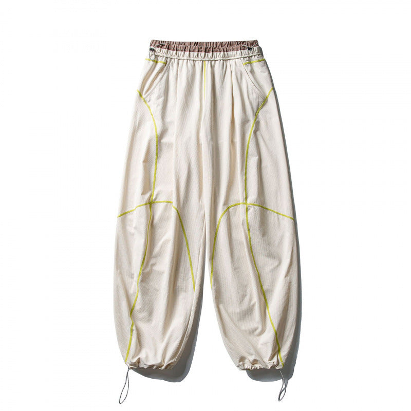 Unisex Locker geschnittene Tech-Jogginghose mit elastischem Bund, markanten Flatlock-Nähten und Kordelzug Shop Nory