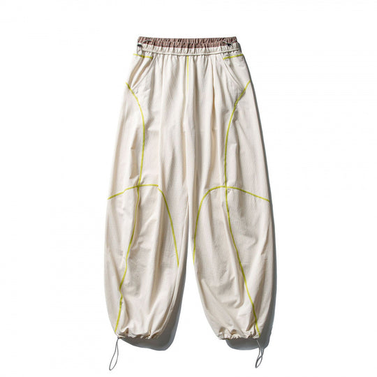 Unisex Locker geschnittene Tech-Jogginghose mit elastischem Bund, markanten Flatlock-Nähten und Kordelzug Shop Nory