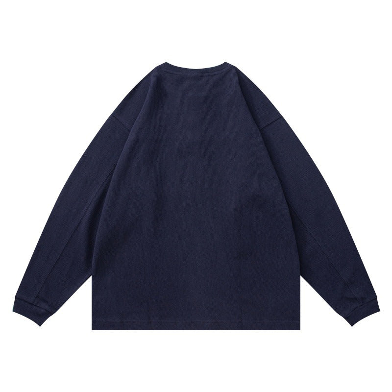 Unisex Strukturiertes Henley-Longsleeve mit Waffelstruktur, halber Knopfleiste und überschnittener Schulter Shop Nory