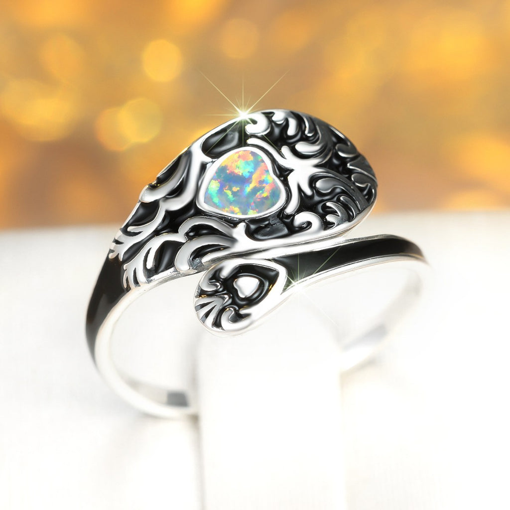 Damen Ring mit kunstvollem Design und schimmerndem Opal Shop Nory
