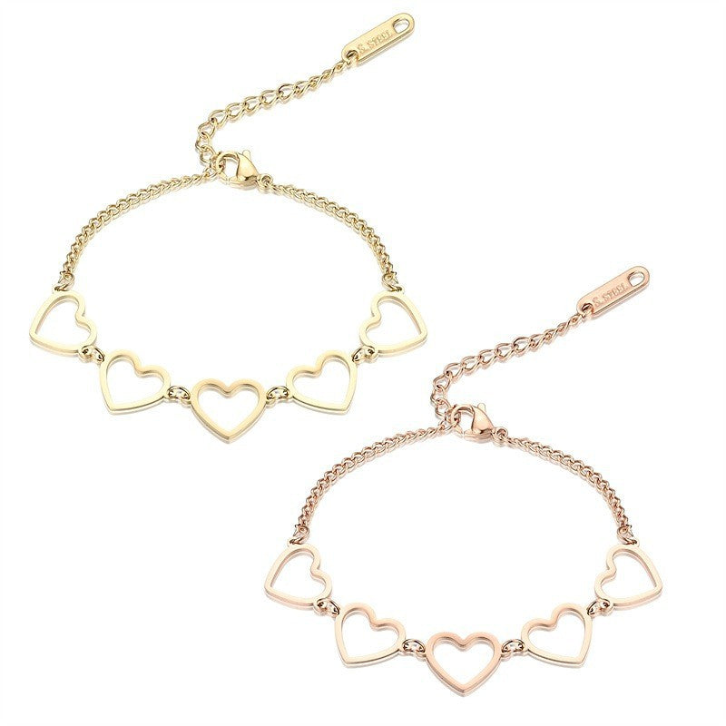 Damen Herzarmband mit eleganten, filigranen Anhängern Shop Nory