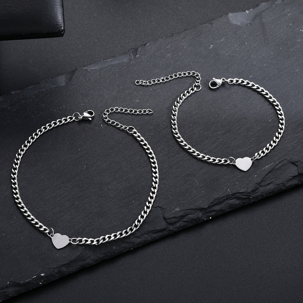 Damenarmband mit herzförmigen Anhängern und eleganter Gliederkette Shop Nory