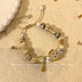 Damen Armband mit bunten Tiermotiven und charmanten Anhängern Shop Nory